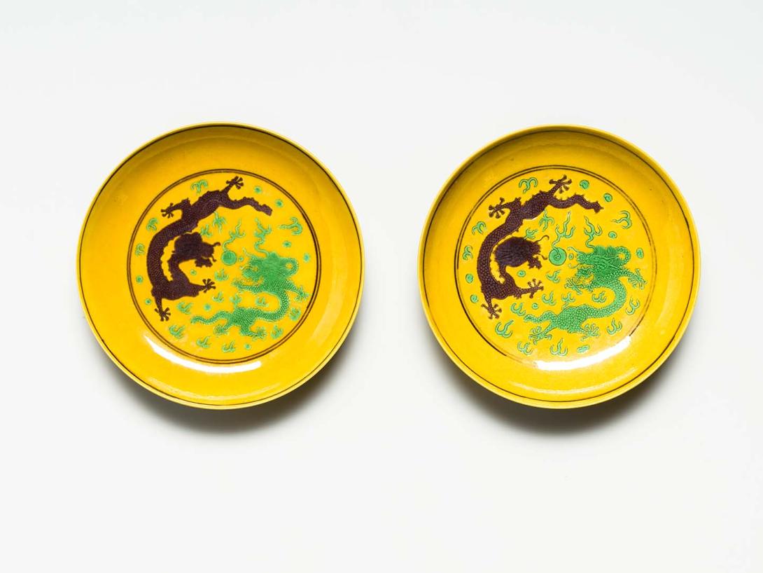 Artwork Pair of imperial five-clawed dragon dishes this artwork made of Porcelain, yellow, brown and green glaze, created in 1862-01-01