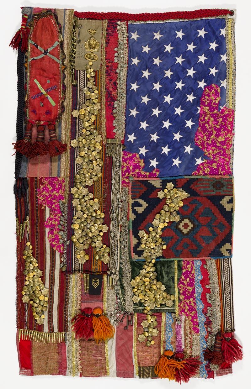 Artwork Glorious Haze this artwork made of Handwoven textiles, silver braid, keys, a brass chain, military emblems, pins, buttons and bullet casings, and a sweet heart pendant from an American World War 2 soldier on vintage American flag, created in 2012-01-01