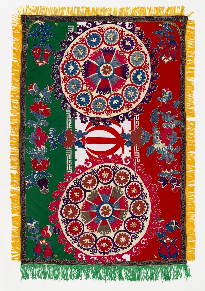 Artwork Cycles (Flag #7) this artwork made of Vintage textiles, military badges and gold guns and aeroplane military pins on Iranian flag