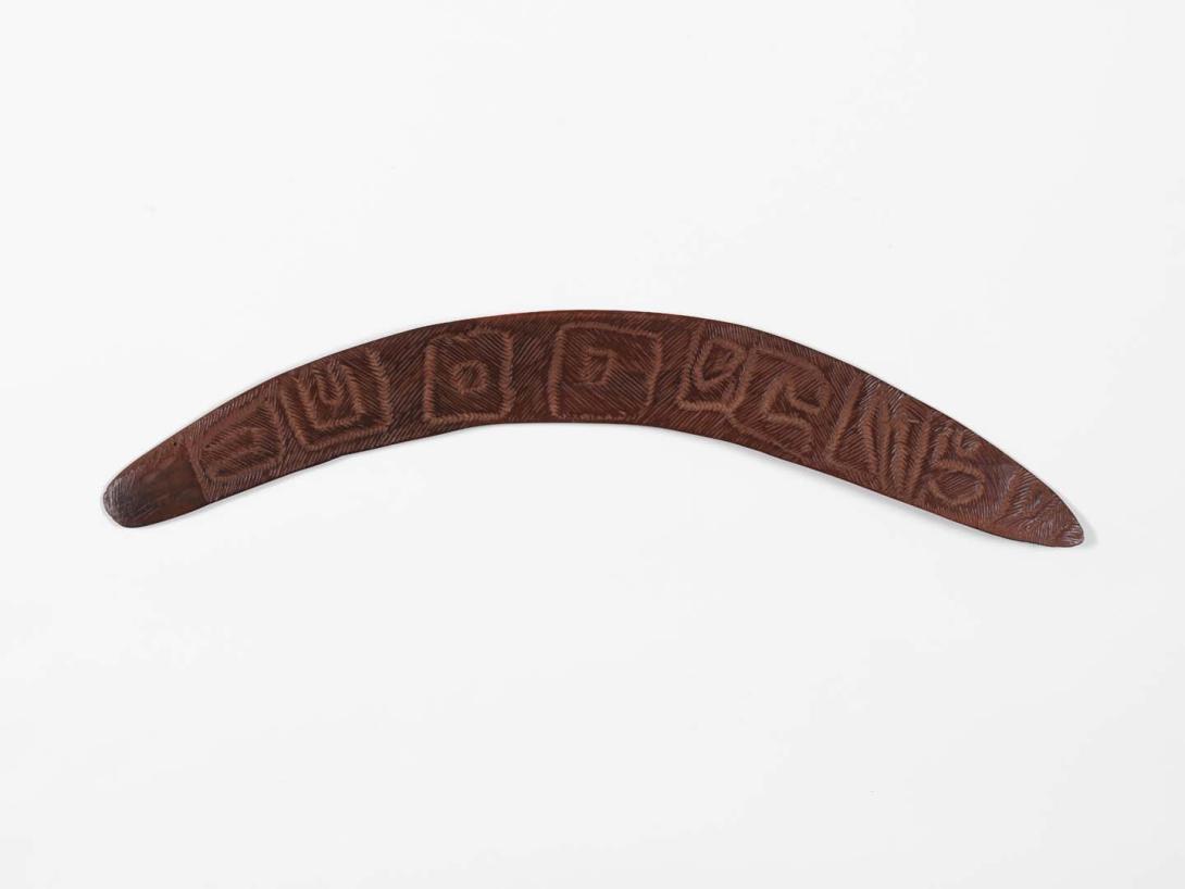 Artwork Boomerang (Longreach area) this artwork made of Carved and incised hardwood with natural pigment infill
