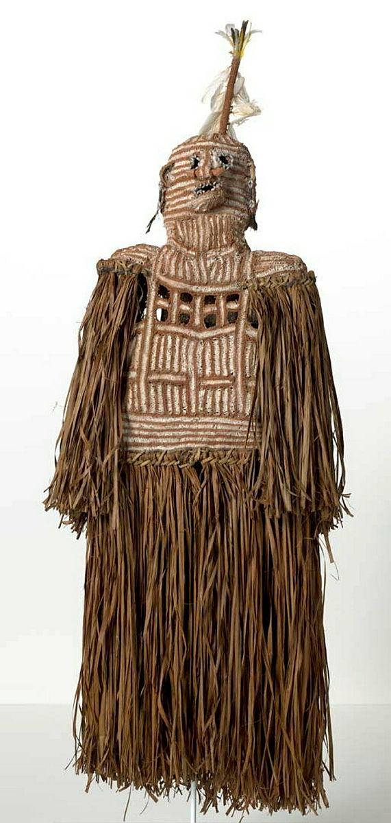 Artwork Jinir (spirit mask) this artwork made of Rattan sago palm fronds, fum (mulberry bark), white cockatoo feathers, natural ochres, lime and a stick, created in 2012-01-01