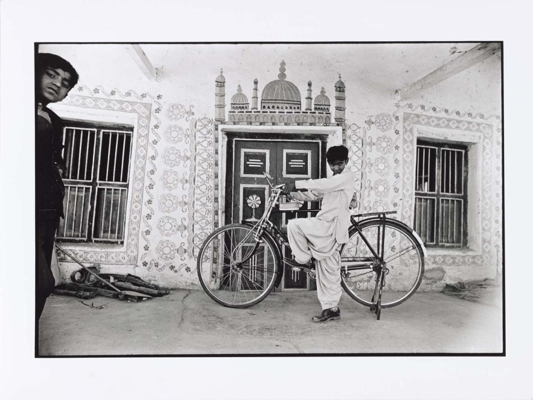Artwork A boy with a bicycle in Dhordo, Gujarat this artwork made of Gelatin silver photograph on paper, created in 1975-01-01