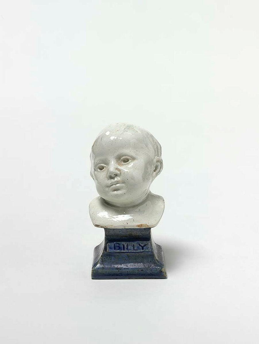 Artwork Billy (Collins) this artwork made of Earthenware, modelled with white glaze and with blue glazed base, created in 1930-01-01