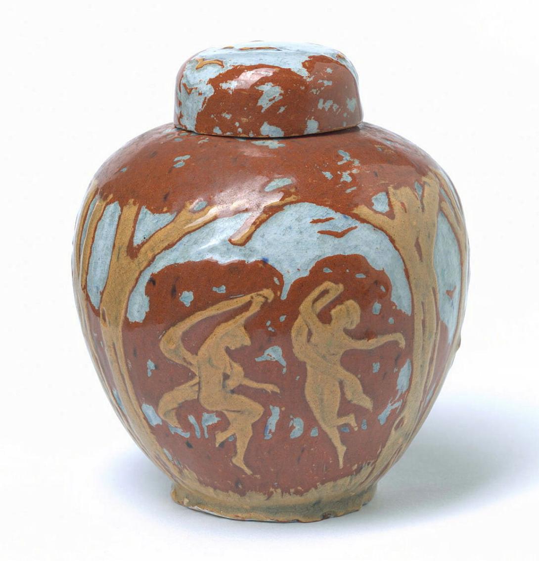 Artwork Covered jar: Maenads this artwork made of Earthenware, gold and terracotta clay over white and incised with a design of maenads dancing between trees. Light blue glaze, created in 1925-01-01