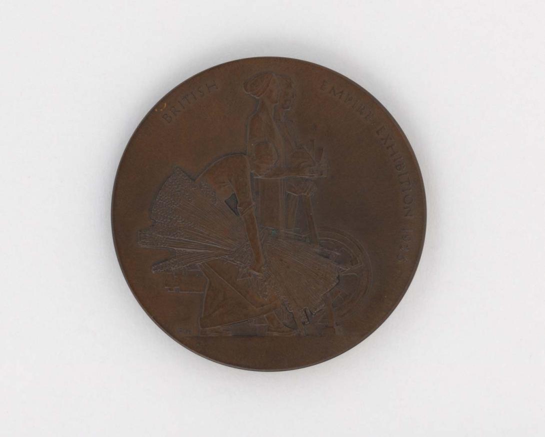 Artwork British Empire Exhibition 1925. Bronze medallion presented to LJ Harvey this artwork made of Bronze