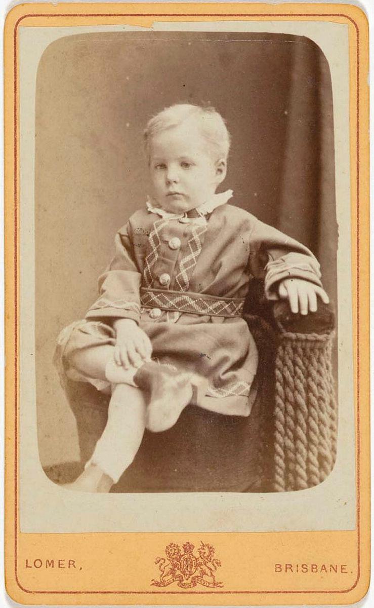 Artwork (Young boy seated) this artwork made of Albumen photograph on paper mounted on card, created in 1870-01-01