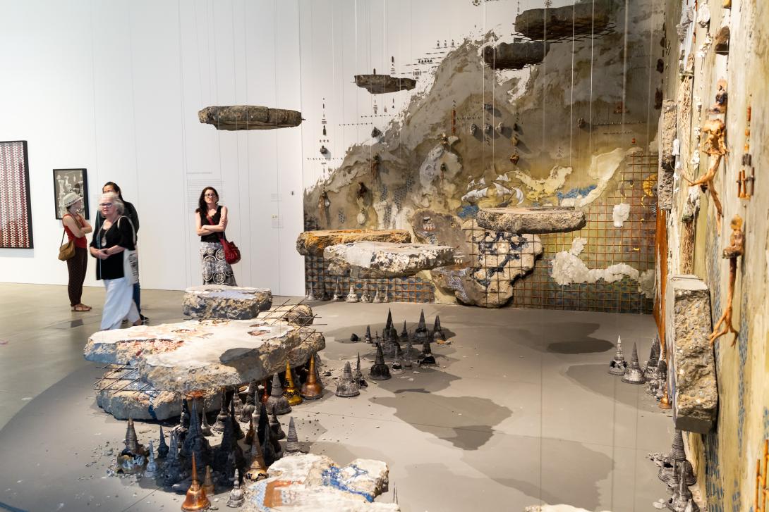 An installation view of a work that evokes a rocky landscape in 3D.