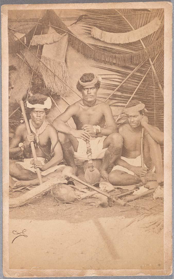 Artwork Three New Caledonian men this artwork made of Albumen photograph on paper mounted on card, created in 1865-01-01