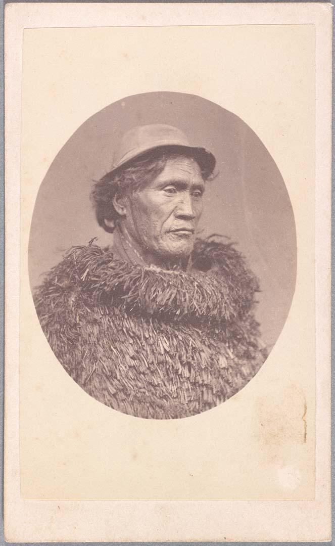 Artwork Māori man this artwork made of Albumen photograph on paper mounted on card, created in 1865-01-01