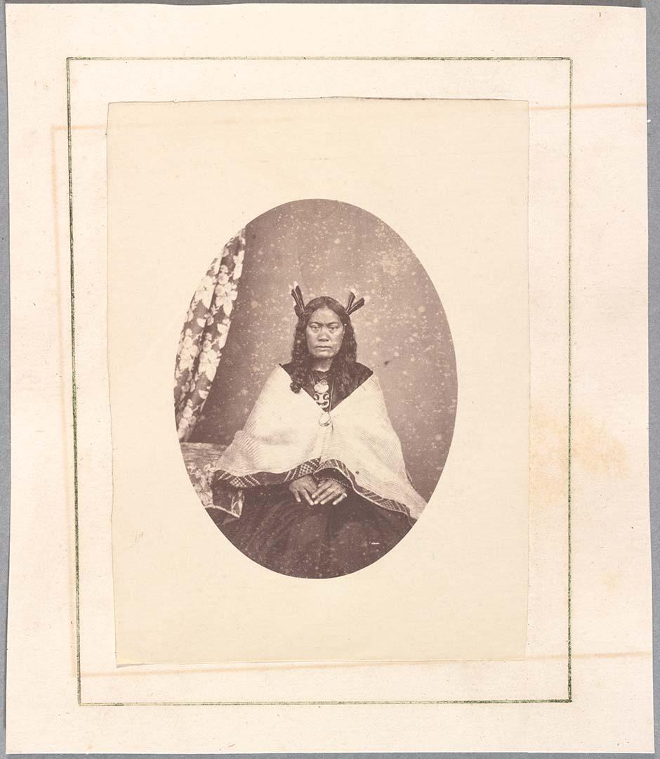 Artwork Māori woman this artwork made of Albumen photograph on paper mounted on card, created in 1865-01-01