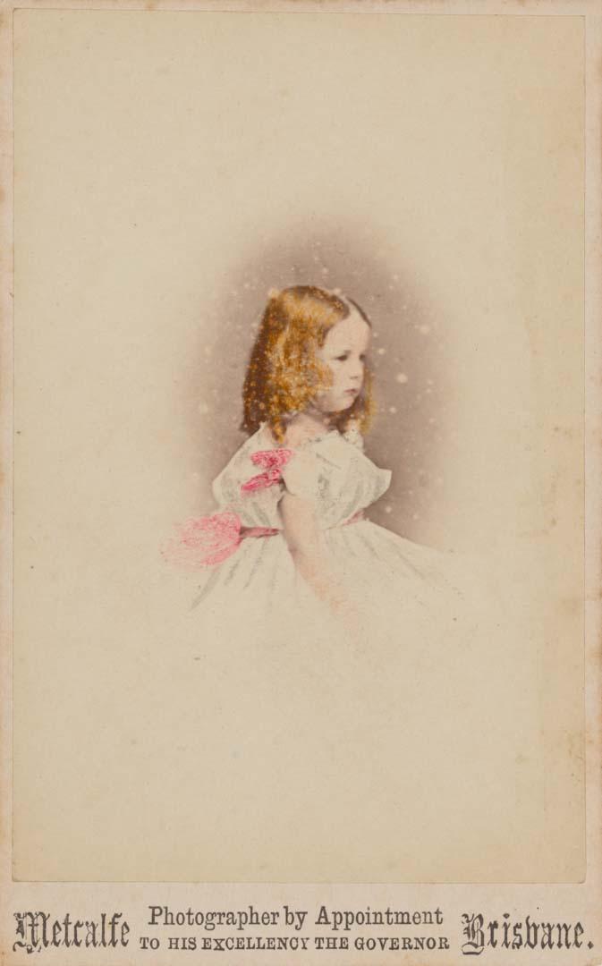 Artwork (Young girl with pink ribbons) this artwork made of Albumen photograph on paper mounted on card, hand coloured