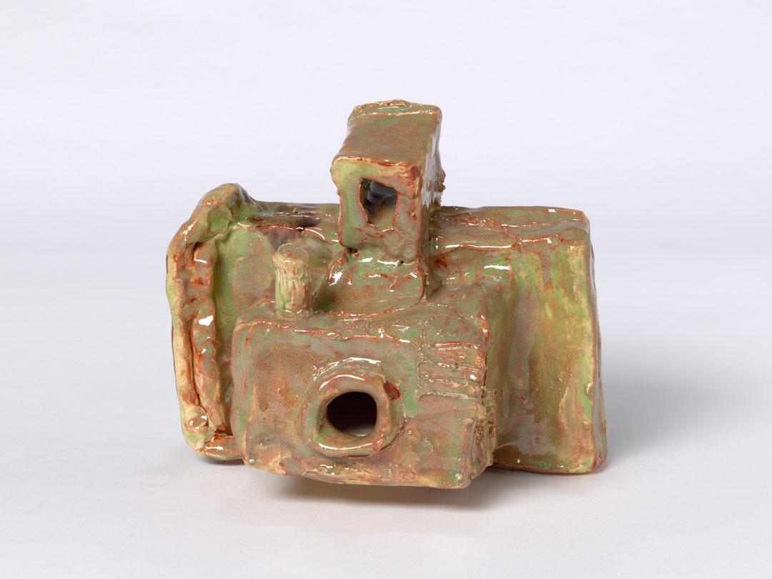 Artwork Not titled (green and brown Polaroid camera) this artwork made of Earthenware with glazes
