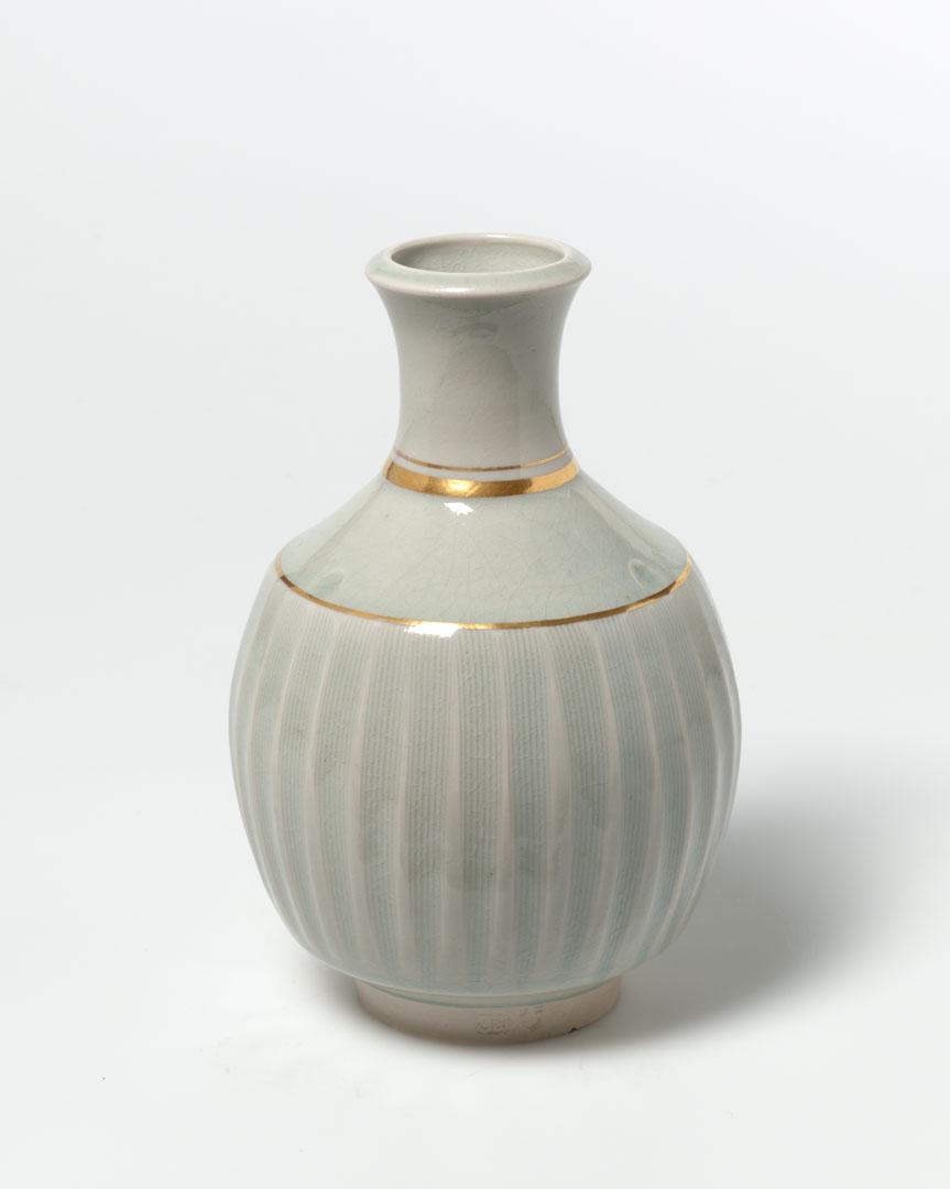 Artwork Celadon vase form this artwork made of Stoneware, thrown with gold trim