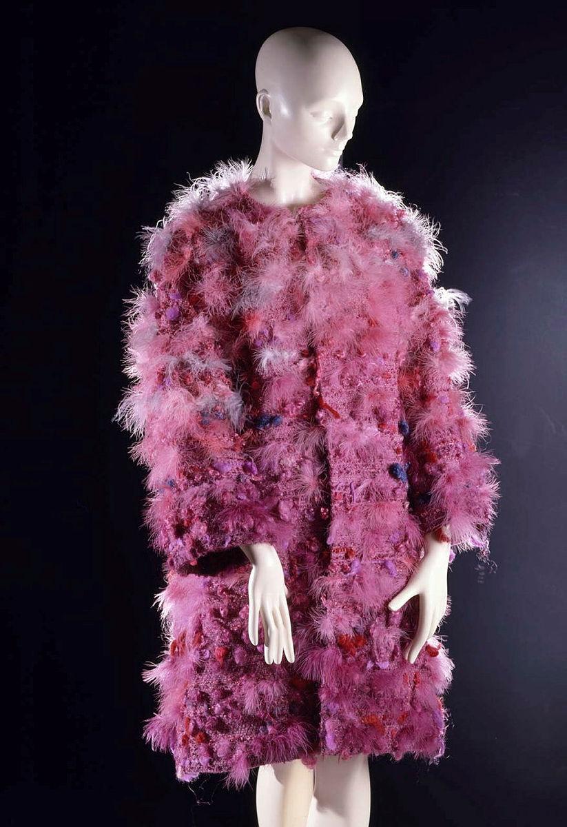 Artwork Coat: Celebration this artwork made of Handspun and dyed wool, mohair and silk and feathers woven with silk lining, created in 1981-01-01