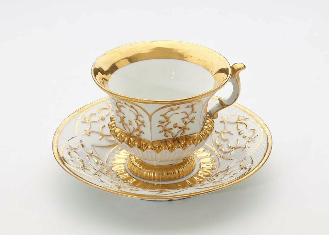 Artwork Cup and saucer this artwork made of Hard-paste porcelain moulded and with gilt and floral details, created in 1850-01-01