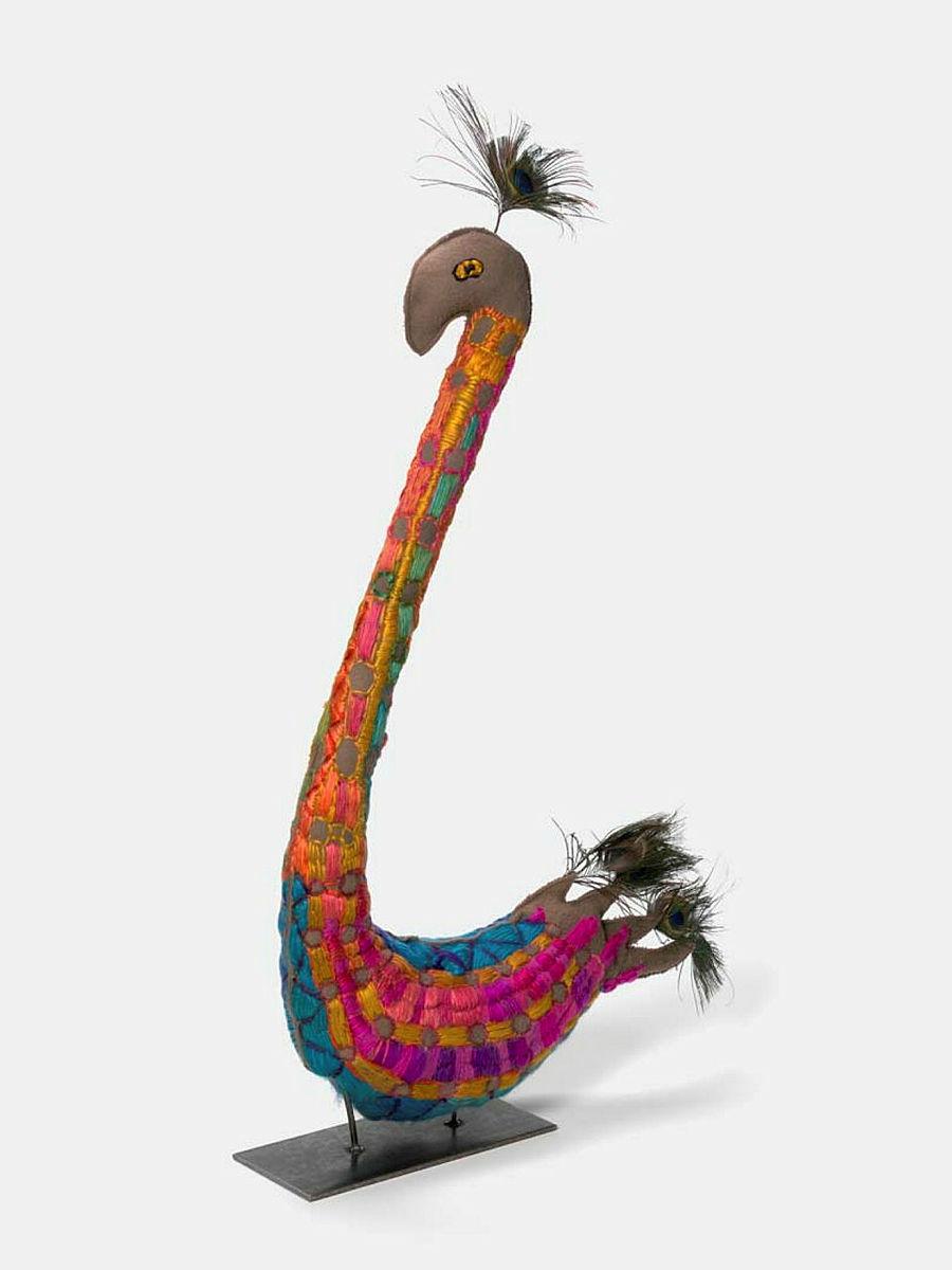 Artwork Water bird (rainbow) this artwork made of Recycled woollen blankets, natural dye, wool, acrylic yarn and peacock feathers, created in 2018-01-01