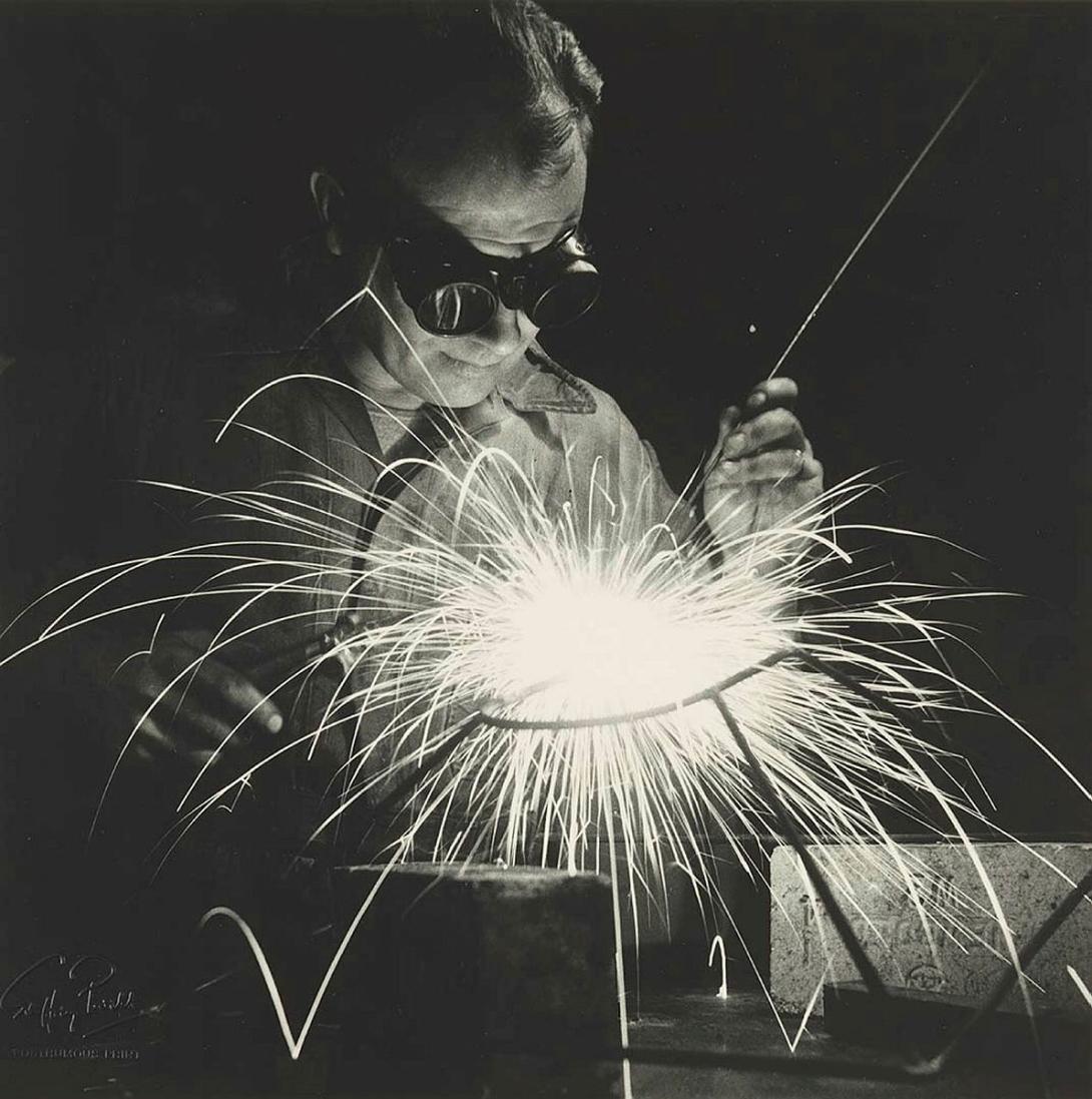 Artwork (Factory worker welding, Sydney) this artwork made of Gelatin silver photograph on paper, created in 1945-01-01