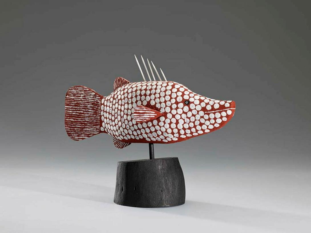 Artwork Wuungkun (Barramundi in Apelech design) this artwork made of Carved milkwood with synthetic polymer paint and natural pigments, created in 2004-01-01