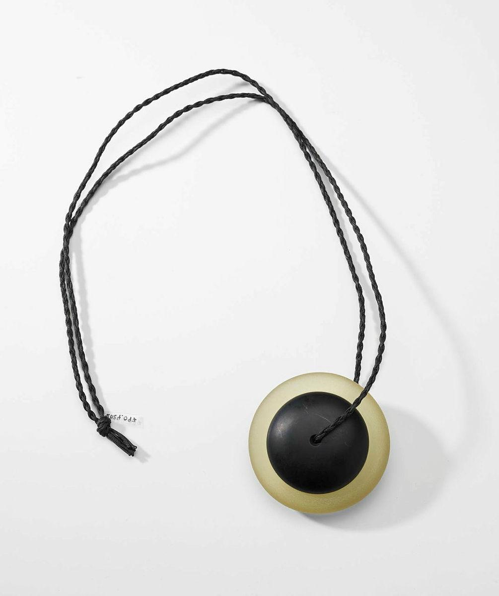 Artwork Four Bits of Fish - Eye this artwork made of Lead crystal, amber on black polyester cord, created in 1993-01-01