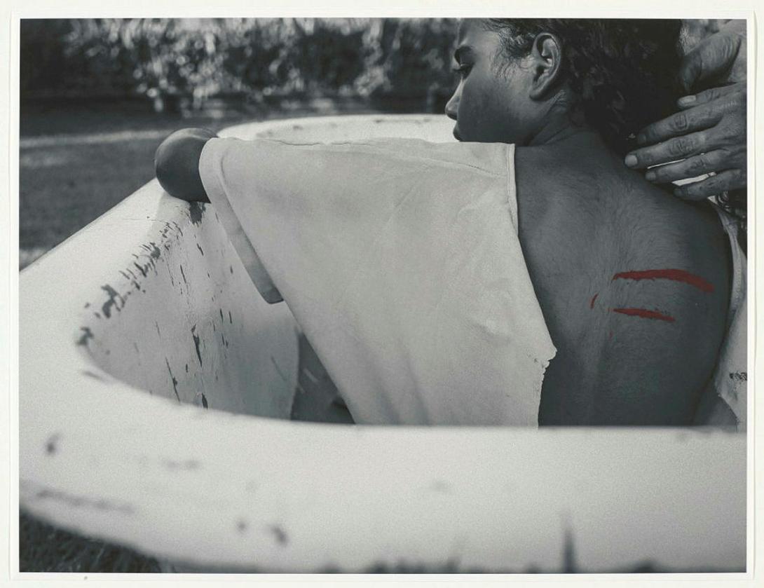 Artwork Bleeding from welts across her body she remembered being picked up by someone on horseback, travelling to a place where ‘there were a lot of coloured people’ and onto Ingham Police Station. ‘I was only small and the lady of the house – I think that was h this artwork made of Photograph on cotton rag, created in 2023-01-01