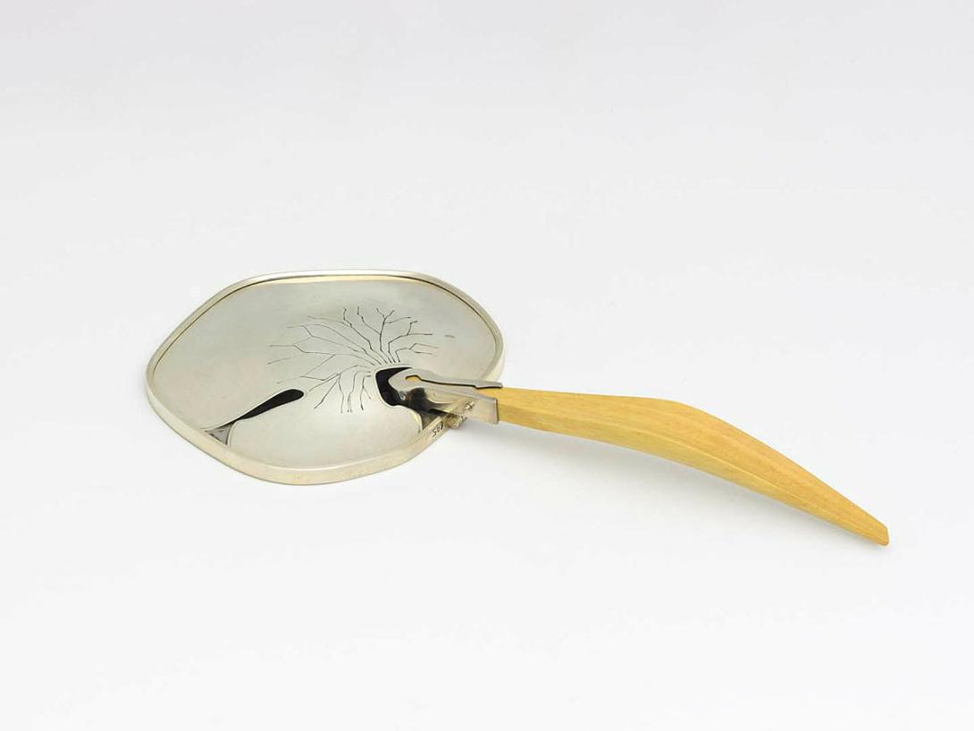 Artwork Mirror: Rainforest reflections this artwork made of Silver and silver ash handle with mirror, created in 1981-01-01