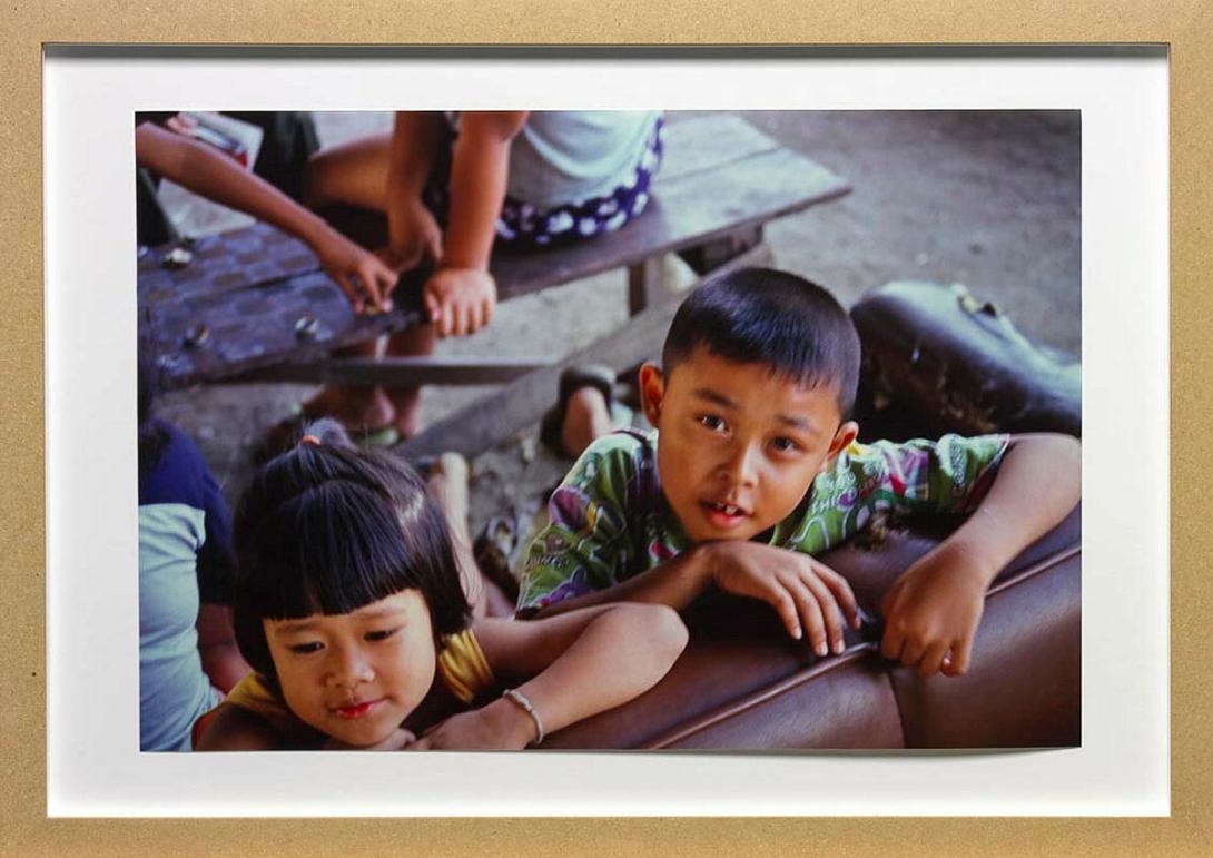 Artwork Untitled (children) this artwork made of Ultra-glossy type C photograph on paper in medium density fibreboard frame, created in 2000-01-01