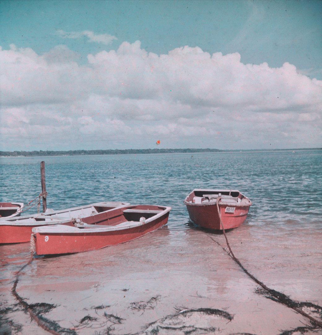 Artwork (Red boats moored in shallow water) this artwork made of Cellulose acetate Dufay colour transparency (originally in a glass mount)