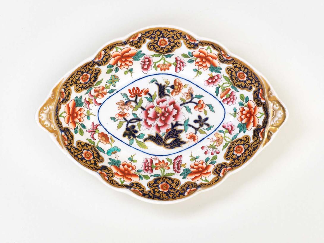 Artwork Dessert dish this artwork made of Bone china decorated in the 'Japan' style with stylised floral motifs in underglaze cobalt and overglaze red and green and gilt, created in 1810-01-01