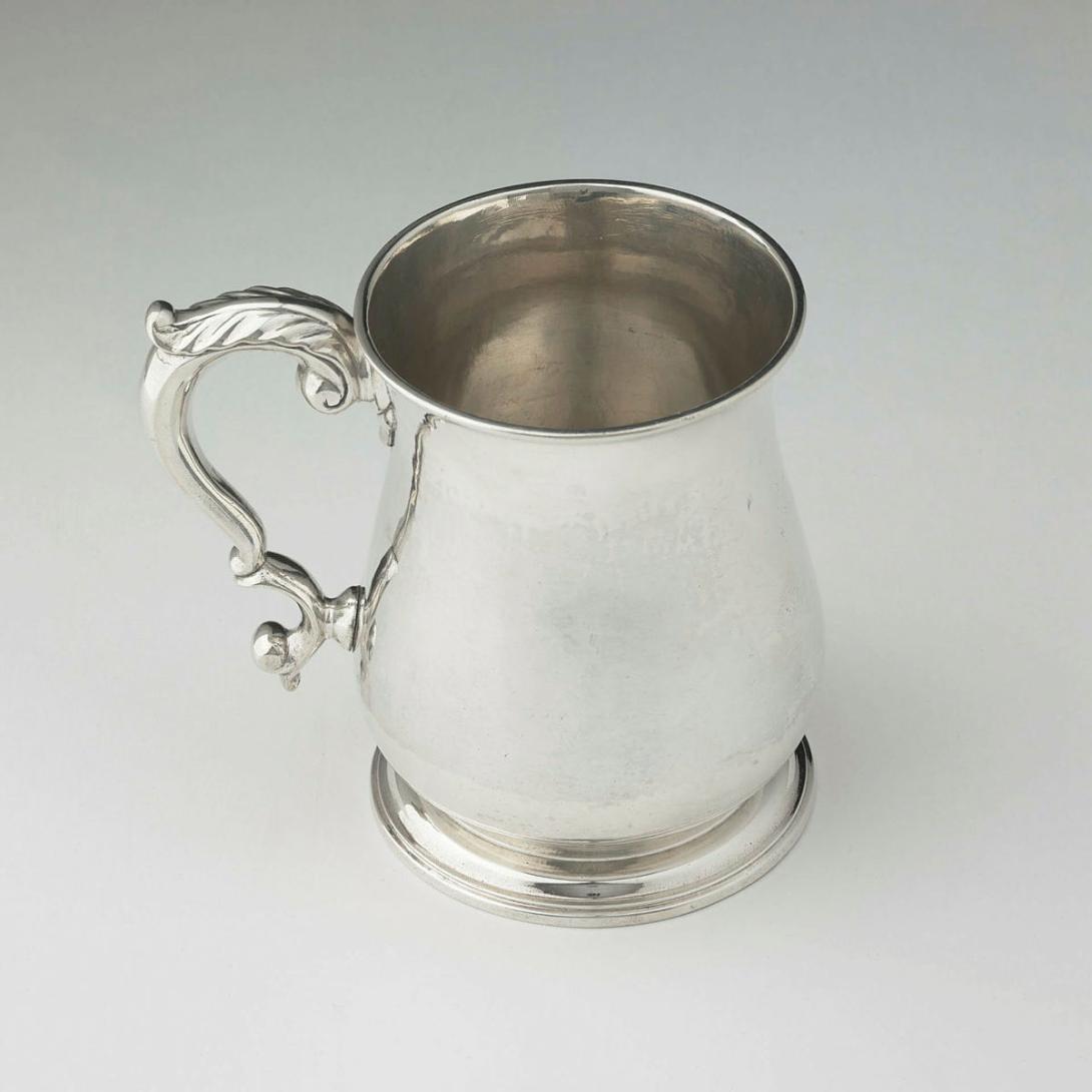 Artwork Tankard this artwork made of Silver, bell shaped mug with scroll handle, created in 1737-01-01