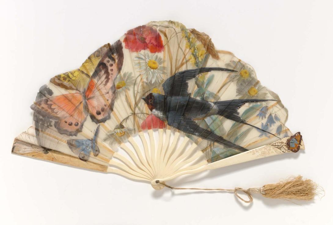 Artwork Fan this artwork made of Ivory sticks with organdie painted with a bird, butterflies, and a flower with silk tassel. One stick carved with a butterfly and coloured, created in 1880-01-01