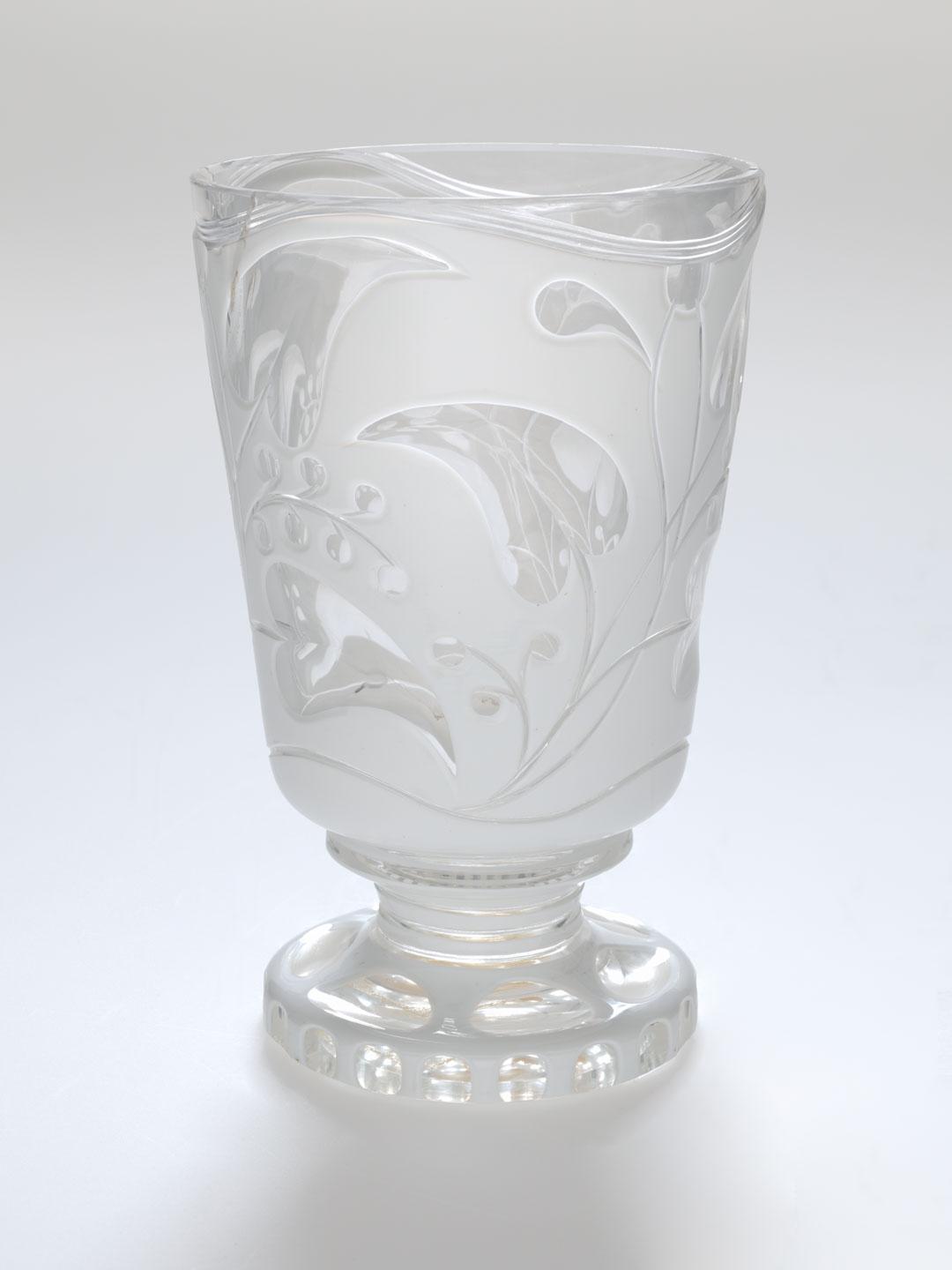 Artwork Footed beaker this artwork made of Clear glass cased white and wheel cut with a trailing vine motif, created in 1840-01-01