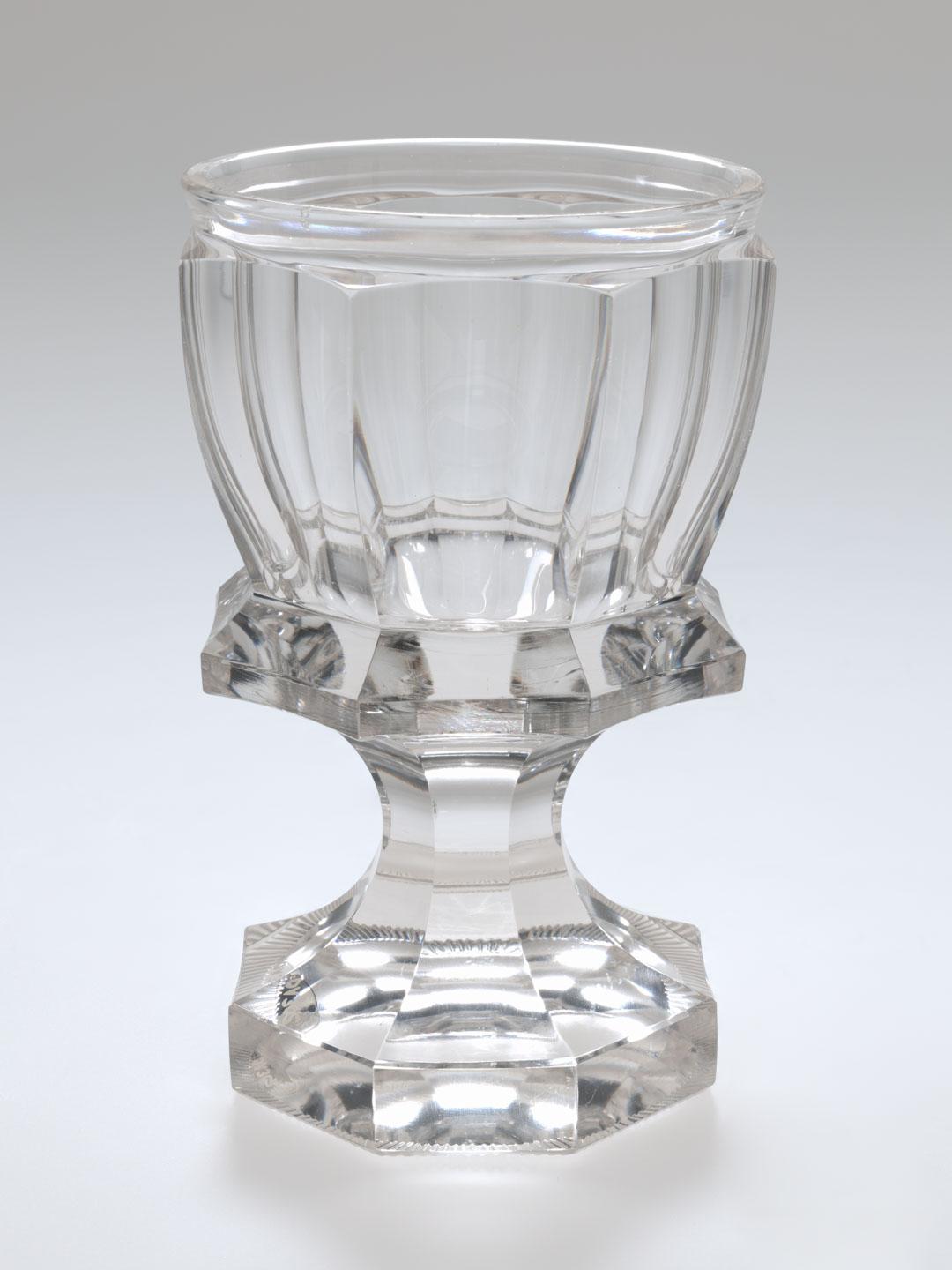 Artwork Goblet this artwork made of Clear glass wheelcut with eight facets and prominent ridge, created in 1840-01-01