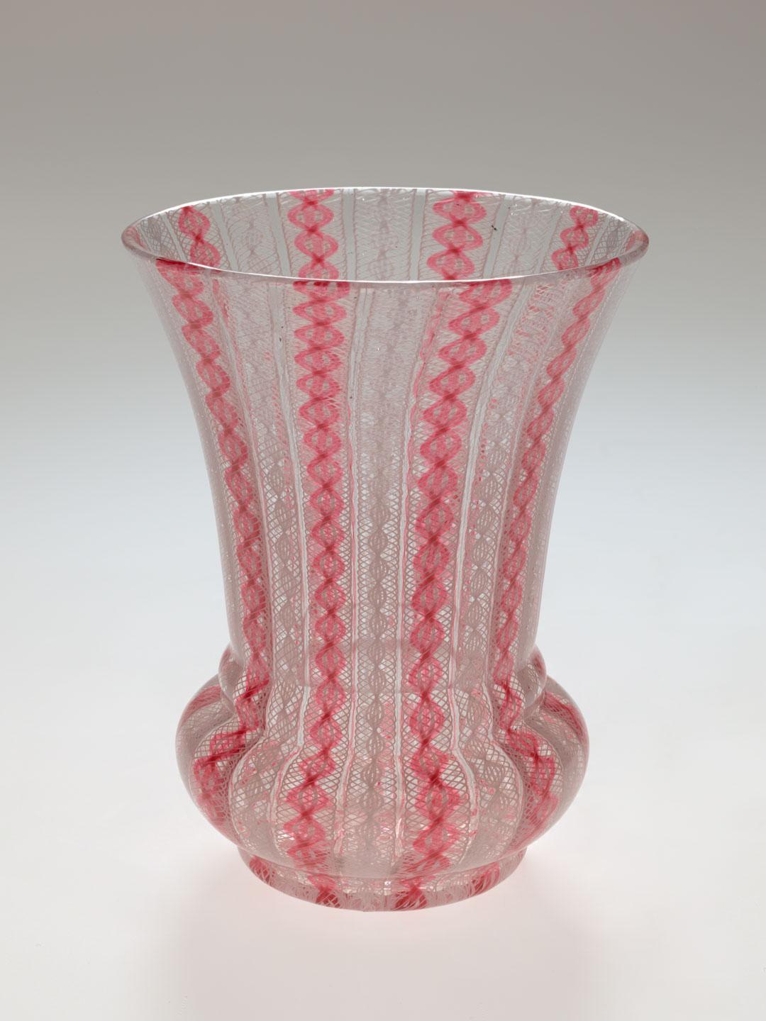 Artwork Beaker this artwork made of Clear glass with pink and white twisted latticino glass, created in 1840-01-01