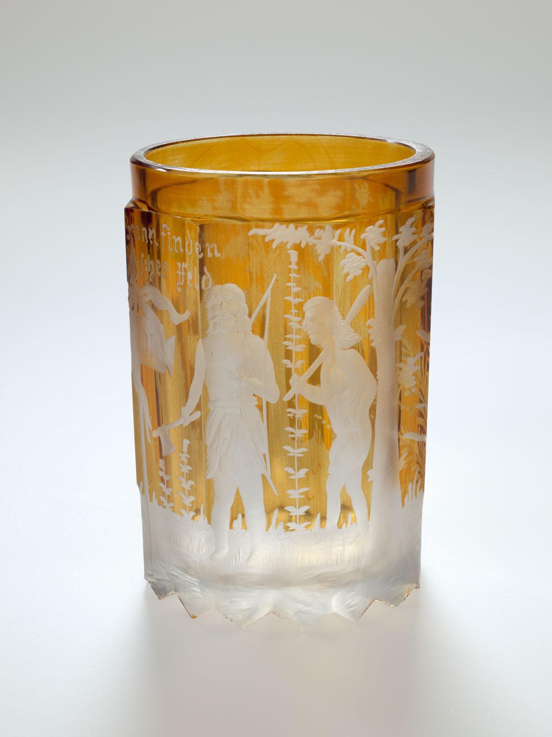 Artwork Beaker this artwork made of Clear glass painted yellow and engraved with a primitive scene of a male figure and a hut in a landscape, created in 1840-01-01