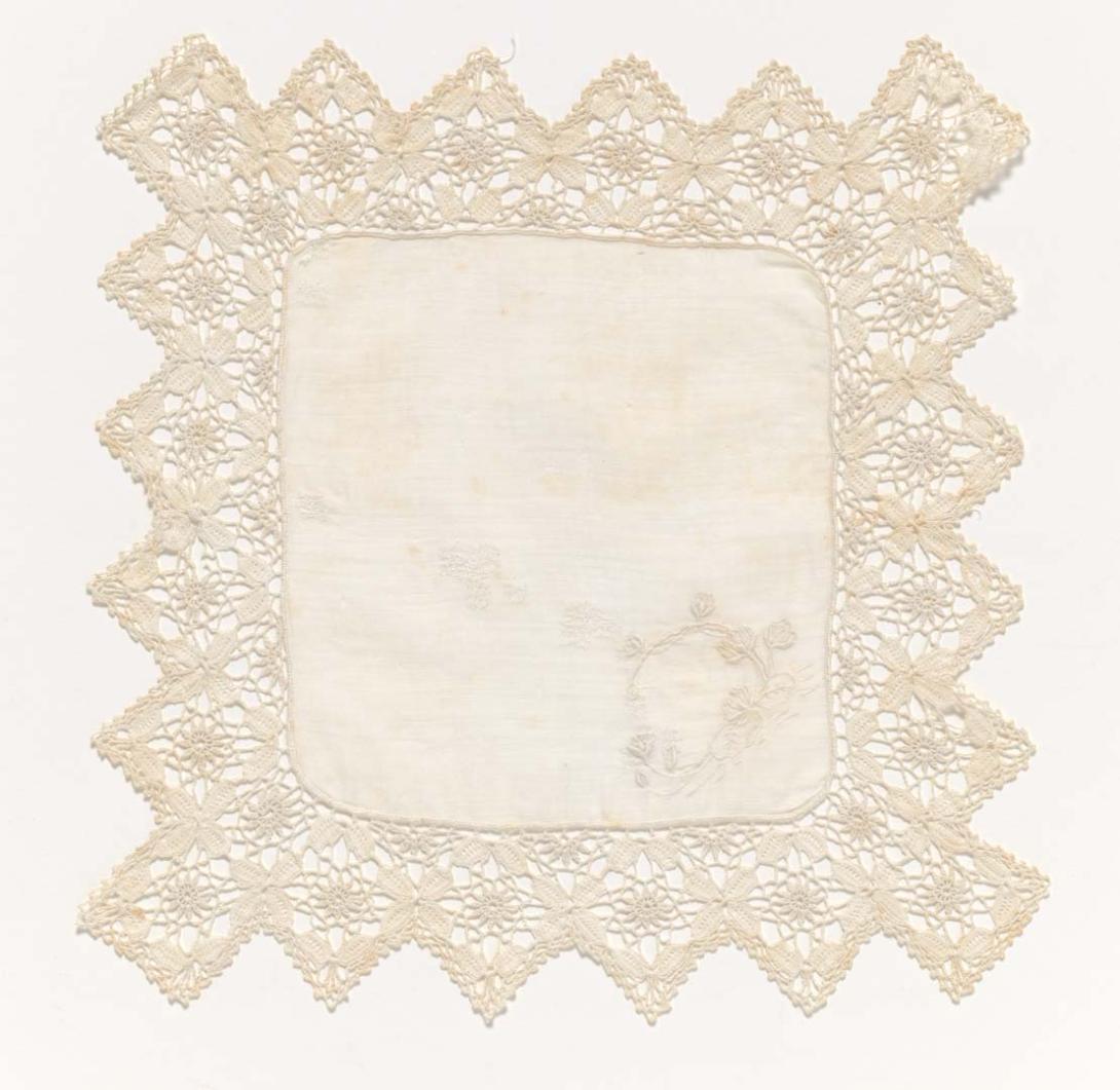 Artwork Handkerchief this artwork made of Linen Bedfordshire Maltese lace with a waterlily design embroidered in one corner, created in 1875-01-01