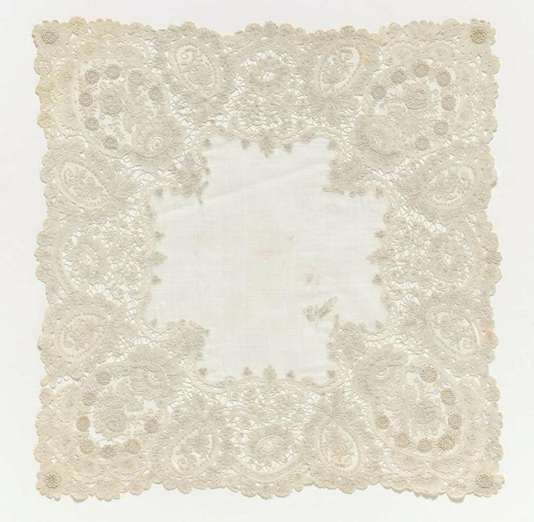 Artwork Handkerchief this artwork made of Brussels mixed lace with needlepoint medallion.  Brussels duchesse.  "Claire" embroidered in one corner, created in 1850-01-01