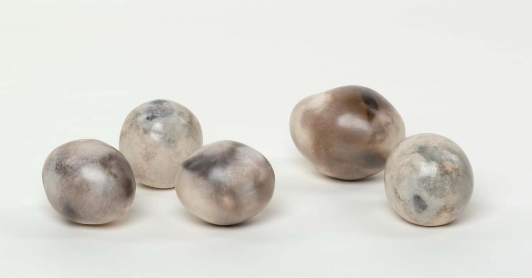 Artwork Group of five eggs this artwork made of Hand-built Walker's white earthenware, burnished, sawdust smoked and fired in top-loading gas kiln to 900 degrees Celsius, created in 1980-01-01
