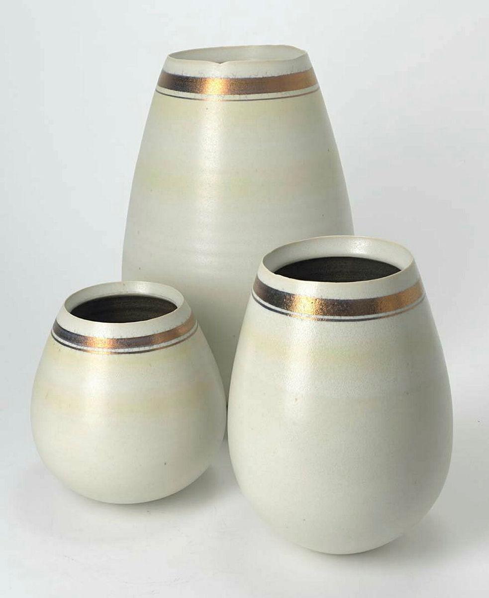 Artwork Group of three vases this artwork made of Stoneware thrown with matt white glaze and gold lustre rim, created in 1981-01-01