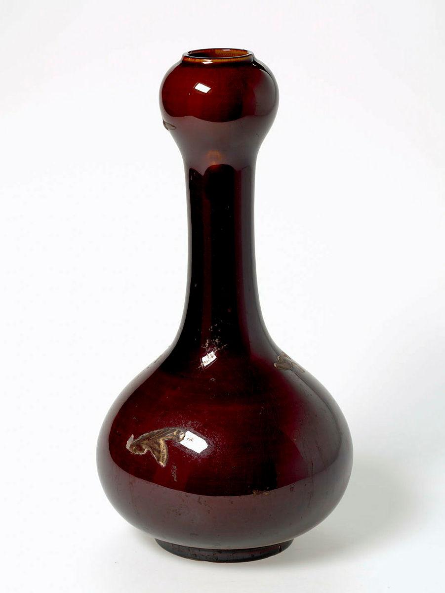 Artwork Vase this artwork made of Stoneware double gourd shape with red brown glaze and gilt details, created in 1900-01-01