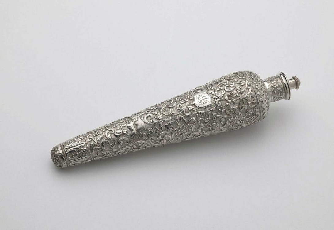 Artwork Perfume flask this artwork made of Spindle shaped silver, elaborately chased with scrolling foliate motifs and animals, created in 1800-01-01