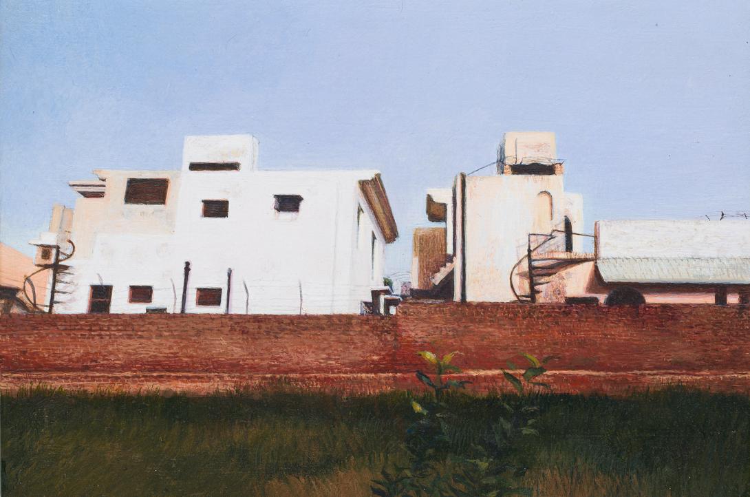 A painting of a white building with small windows; a blue sky is above and red clay or dirt lies in the foreground.